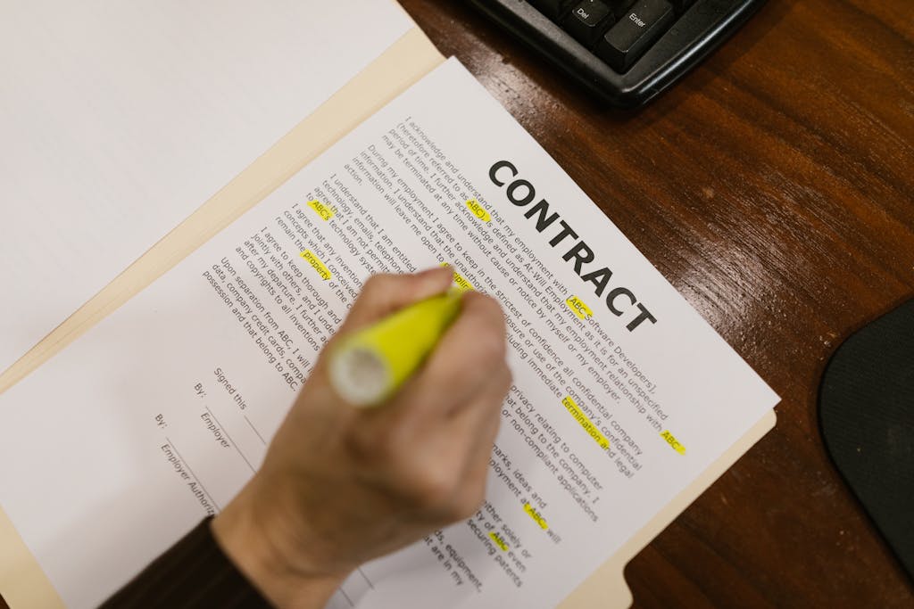 Close-Up Shot of a Person Holding a Contract